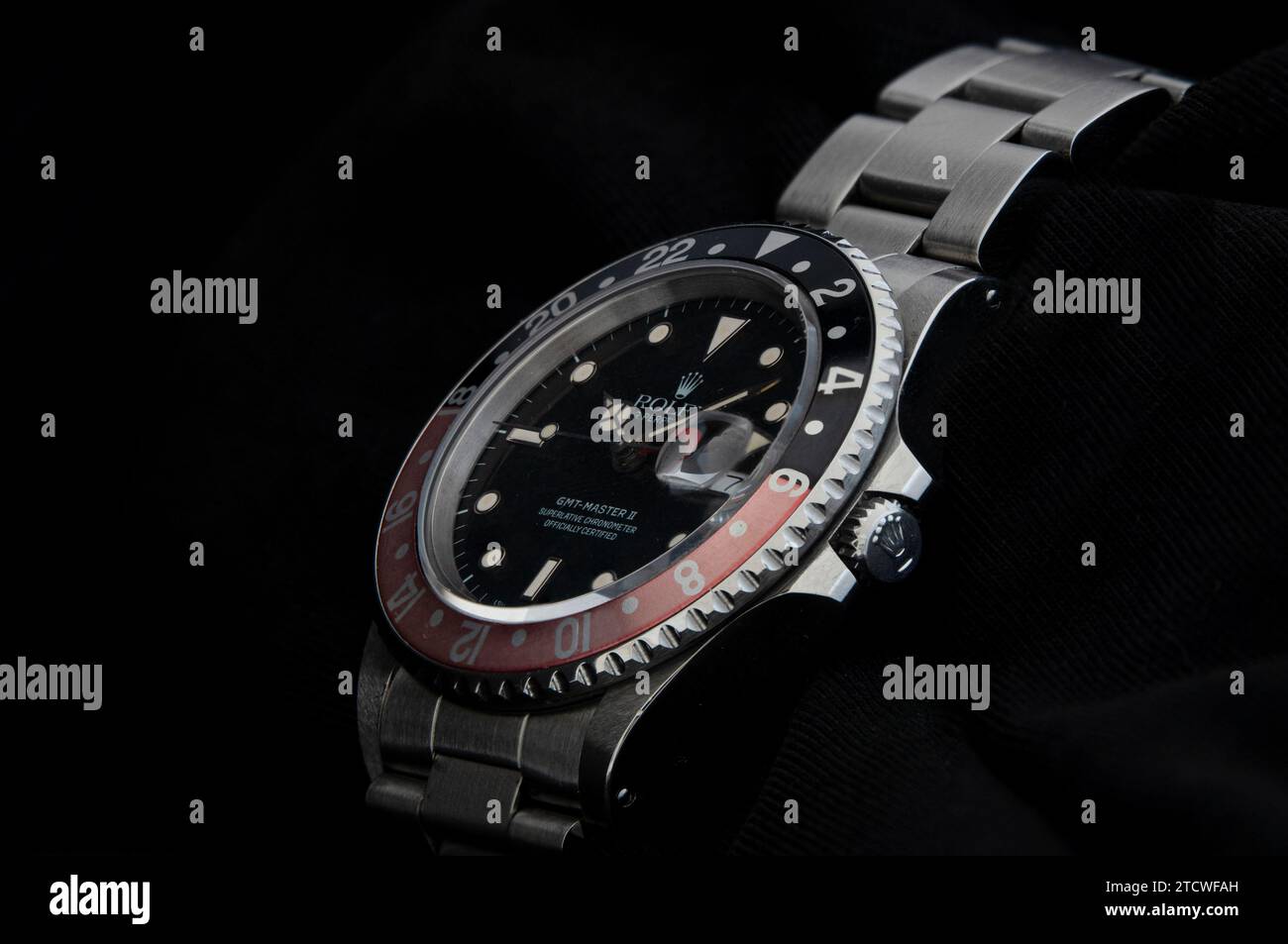 Rolex GMT Master II wristwatch from Rolex a Swiss watchmaker of luxury watches. Isolated on black background. Copenhagen, Denmark - September 20, 2023 Stock Photo