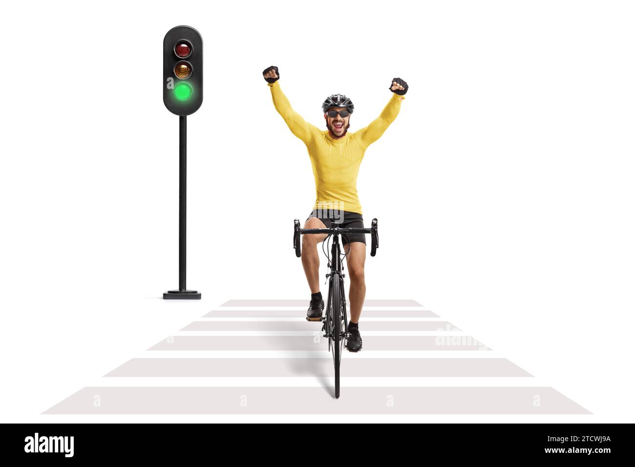 Male cyclist riding a road bicycle at a pedestrian crossing isolated on