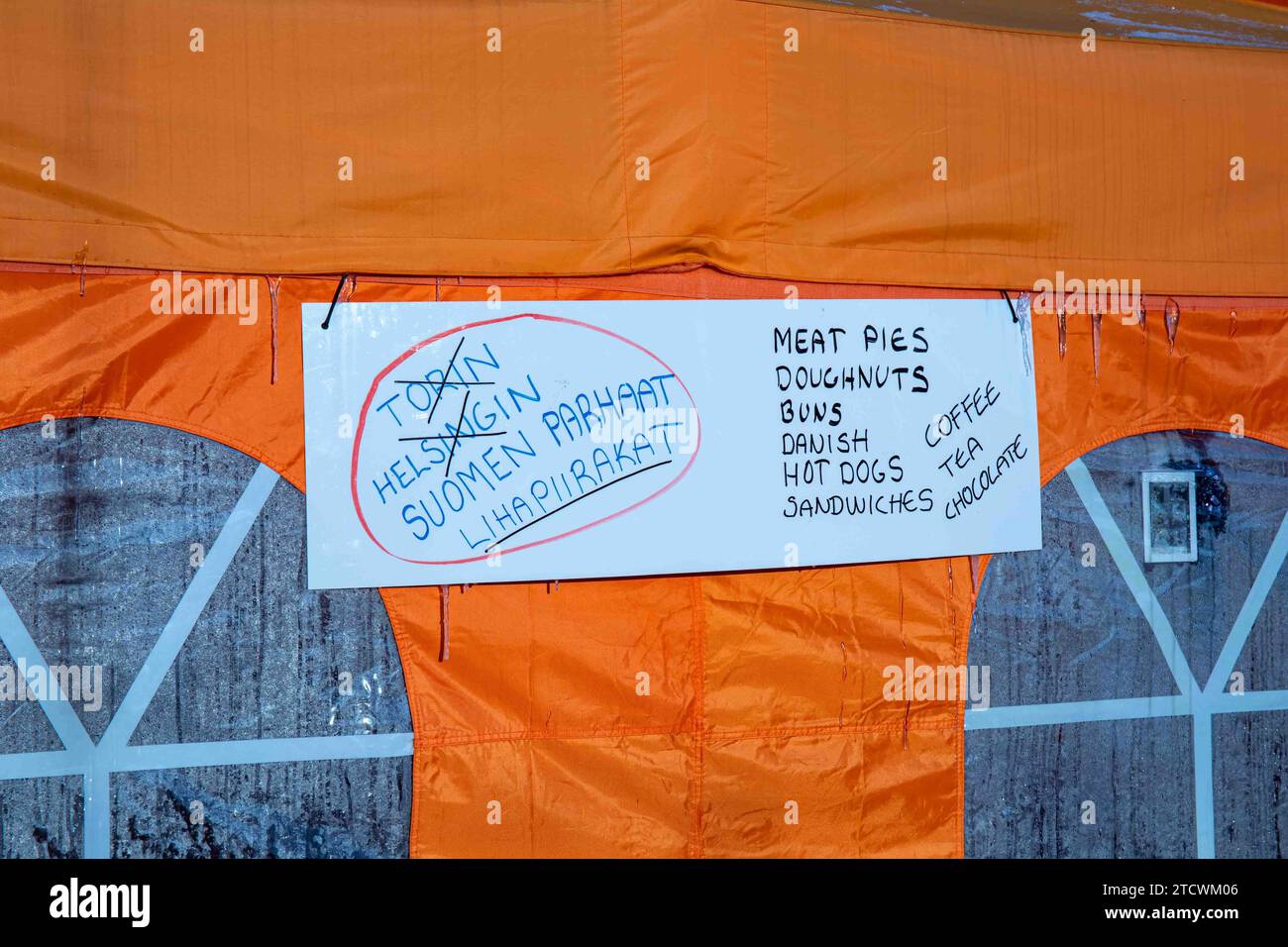 Hand-written sign on orange tent café in Helsinki Market Square, Finland Stock Photo