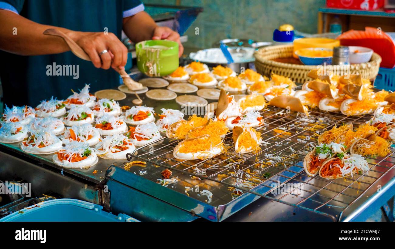 Khanom Bueng. White cream made from egg whites mixed with sugar, beaten until smooth like