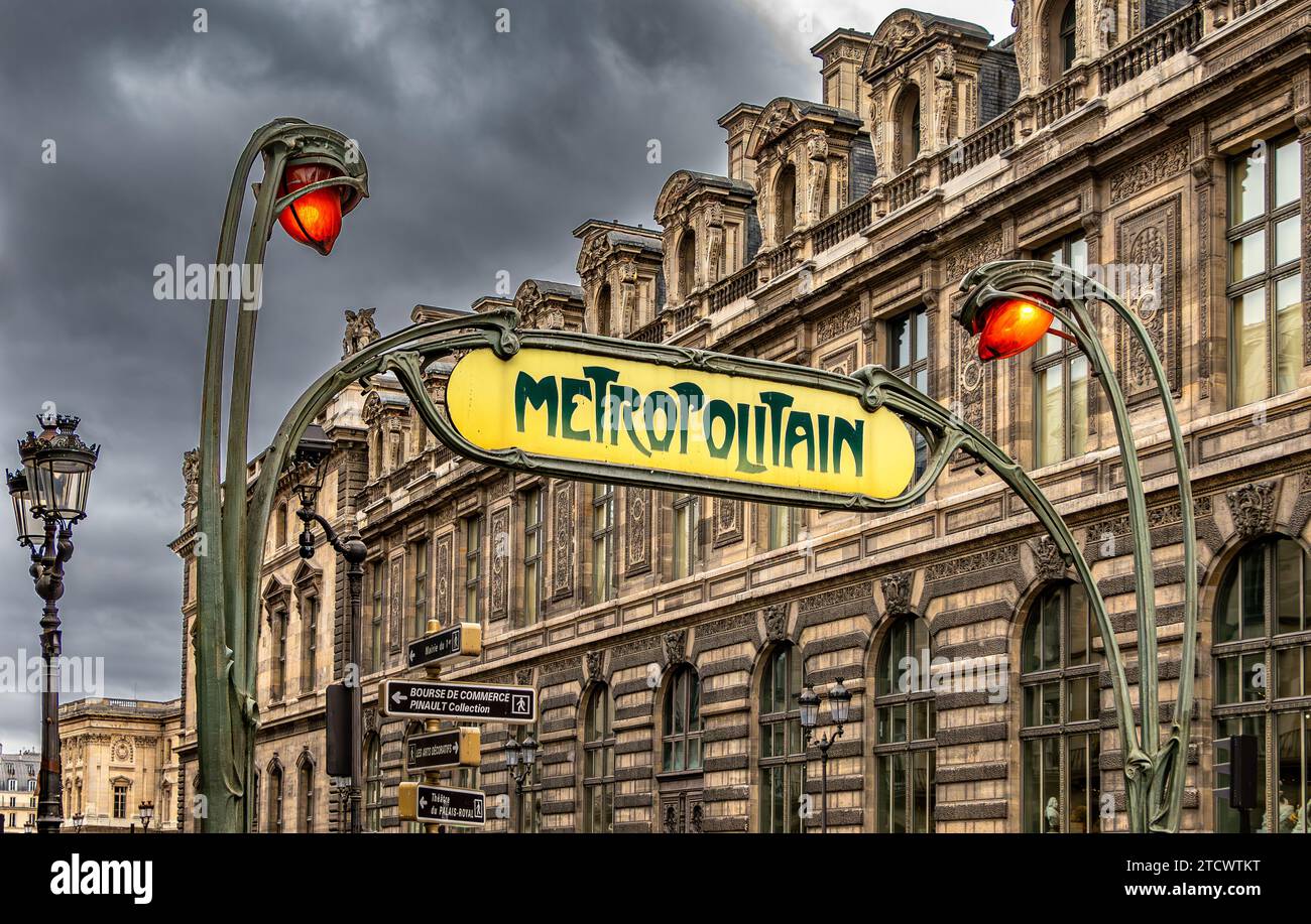 A Hector Guimard  ,Art Nouveau Metropolitan sign at Palais Royal - Musée du Louvre Metro station in Paris,France Stock Photo