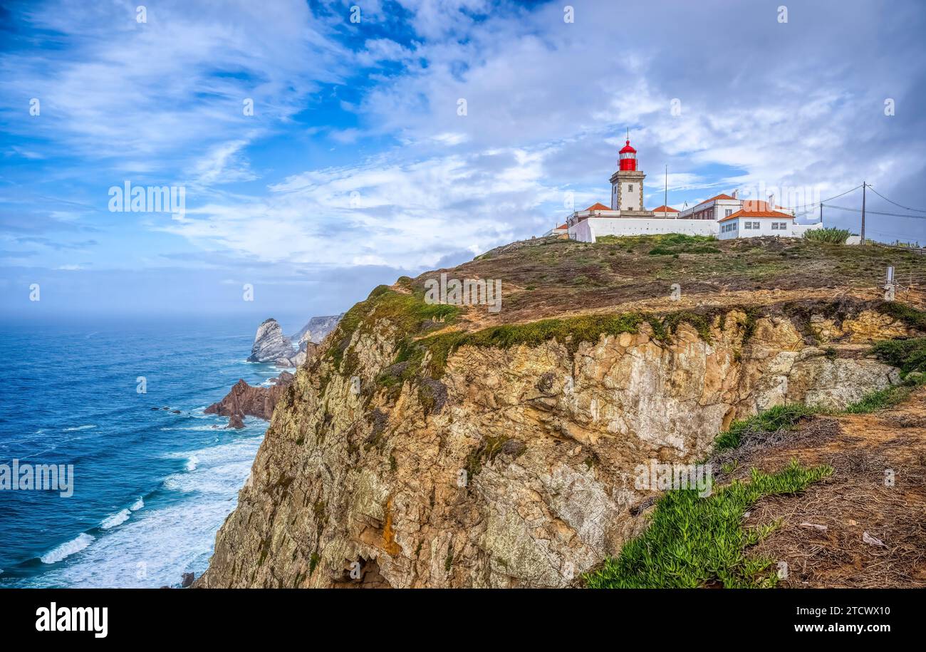 The Cabo da Roca Lighthouse ( Farol do Cabo da Roca) is a beacon or lighthouse on the westernmost point of continental Europe in Sintra Portugal Stock Photo