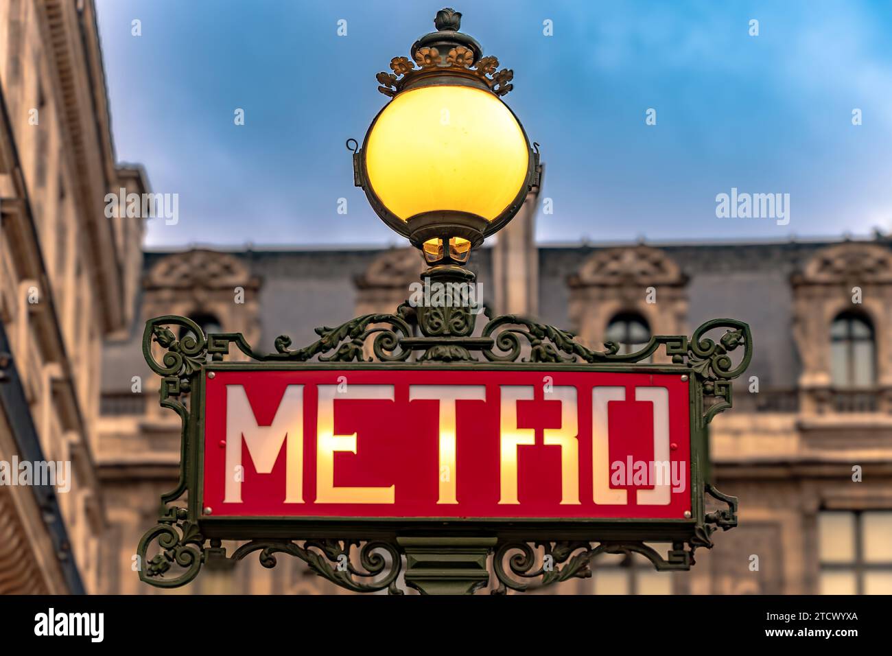 An illuminated Val d'Osne Paris Metro sign at Louvre - Rivoli Metro station ,Paris, France Stock Photo