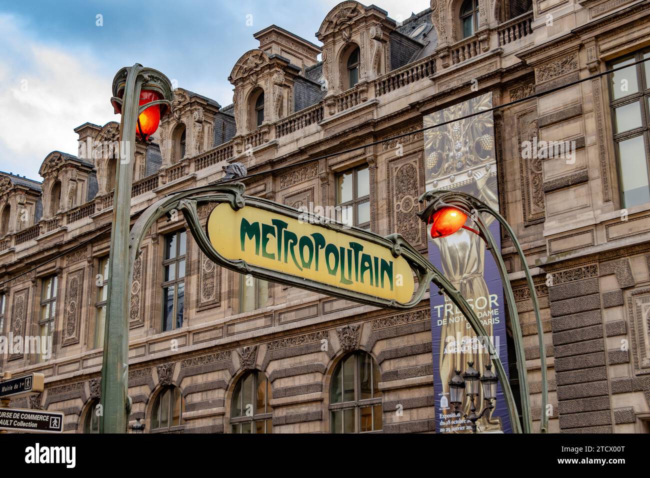 A Hector Guimard designed enclosure or entourage style Paris Metro stain entrance at Louvre - Rivoli Metro station , Paris, France Stock Photo