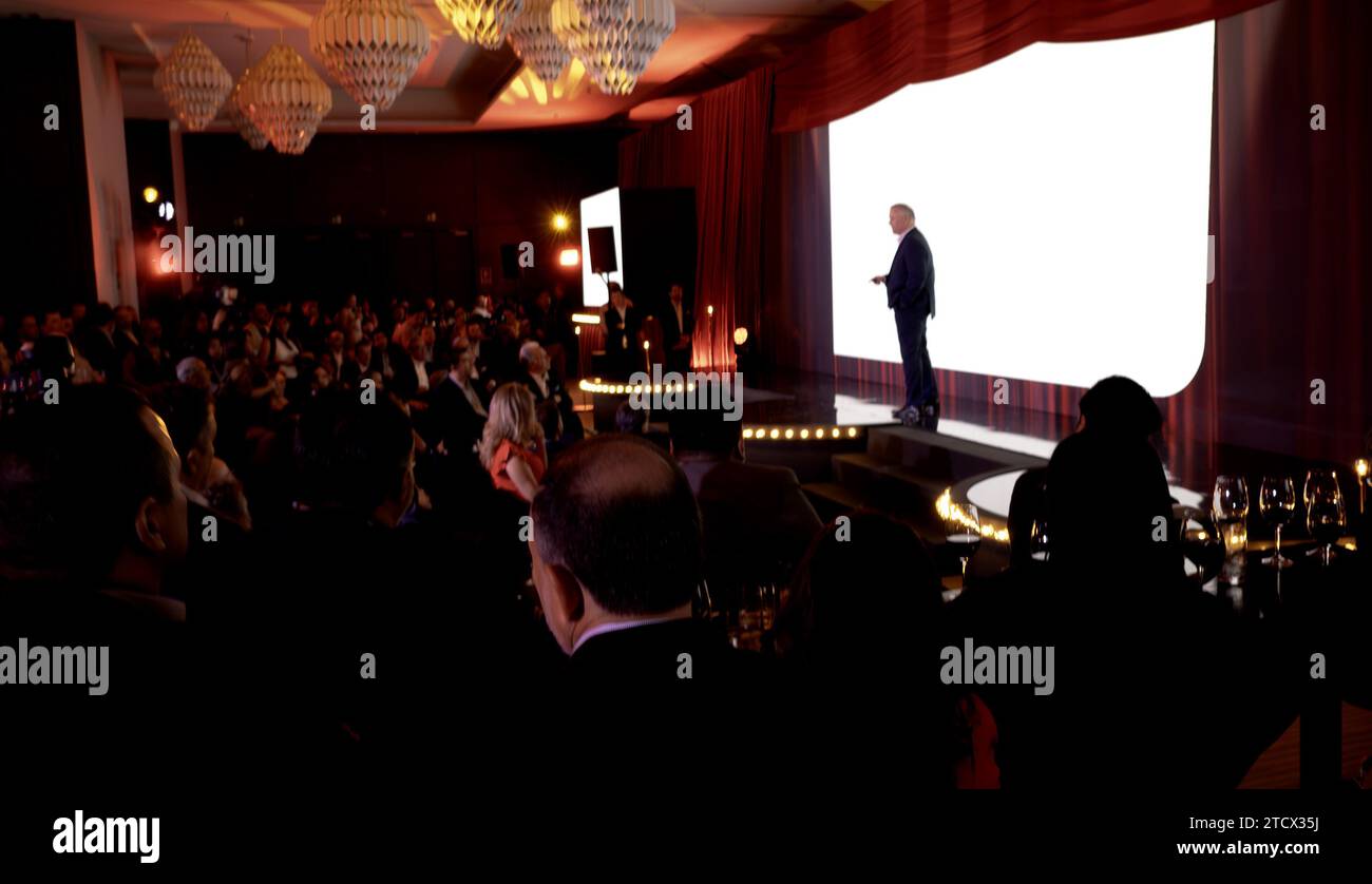 People attending a business presentation in an hotel Stock Photo