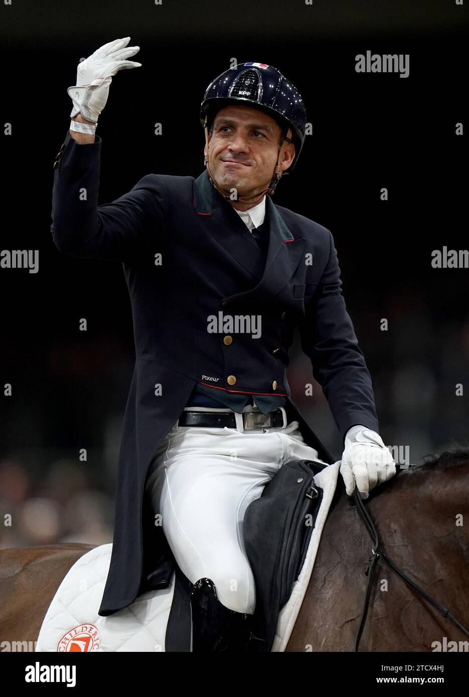 Jolene ridden by France's Alexandre Ayache reacts following their performance during the FEI Dressage World Cup on day two of the London International Horse Show at ExCel London. Picture date: Thursday December 14, 2023. Stock Photo