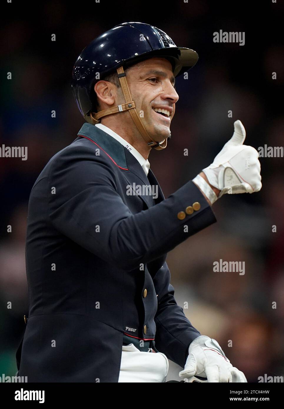 Jolene ridden by France's Alexandre Ayache reacts following their performance during the FEI Dressage World Cup on day two of the London International Horse Show at ExCel London. Picture date: Thursday December 14, 2023. Stock Photo