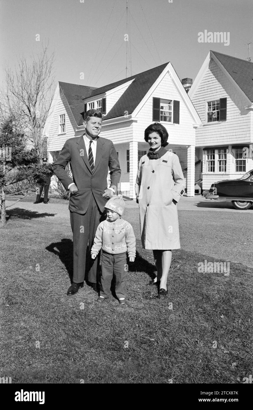 U.S. Senator and Democratic nominee for U.S. President John F. Kennedy with his wife Jacqueline Kennedy and daughter Caroline, standing outside their house, Irving Street, Hyannis Port, Massachusetts on election day, Marion S. Trikosko, U.S. News & World Report Magazine Photograph Collection, November 8, 1960 Stock Photo