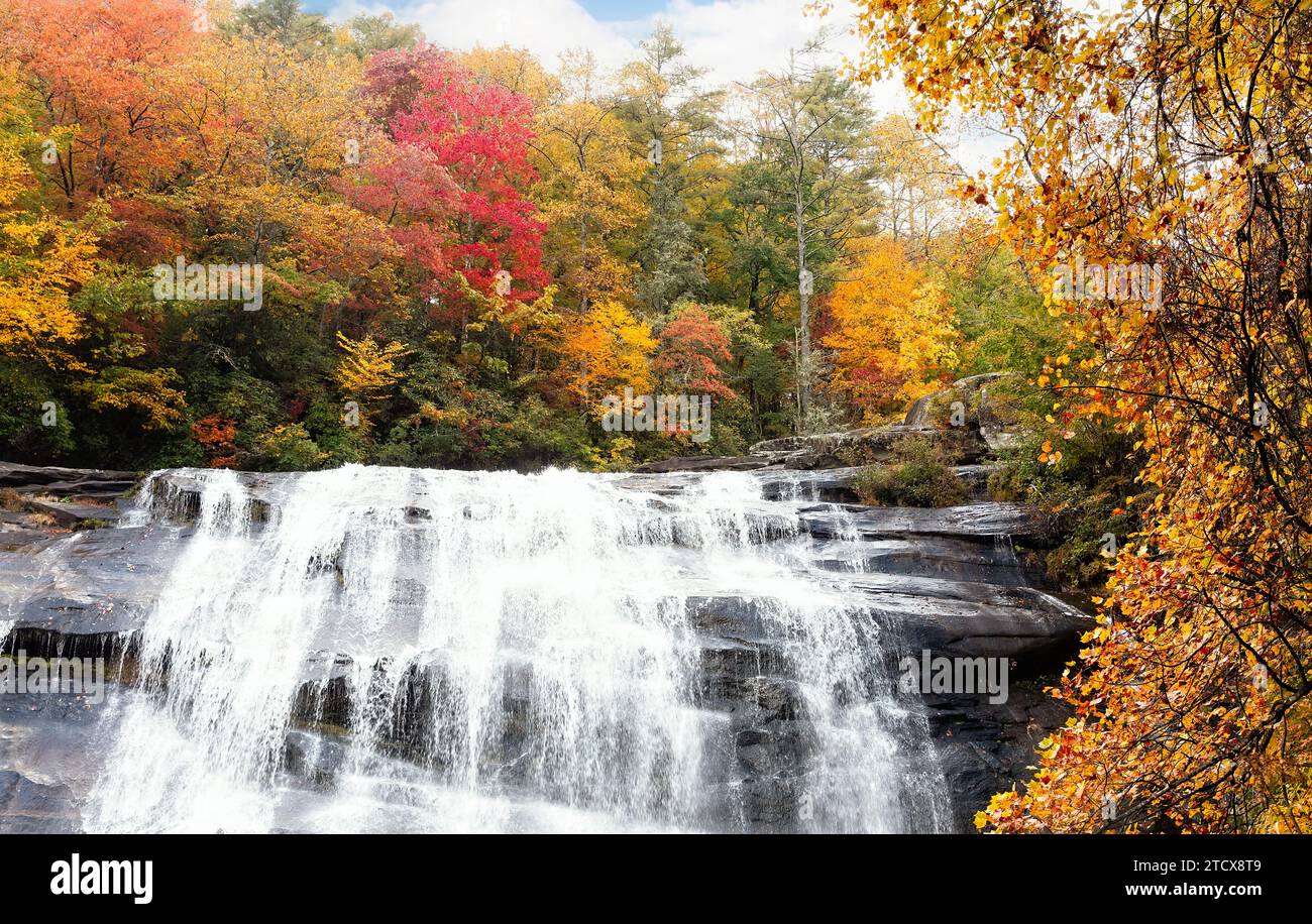 Rainbow Falls in Gorge National Park, Highlands,  North Carolina with Autumn Colors on Trees. Stock Photo