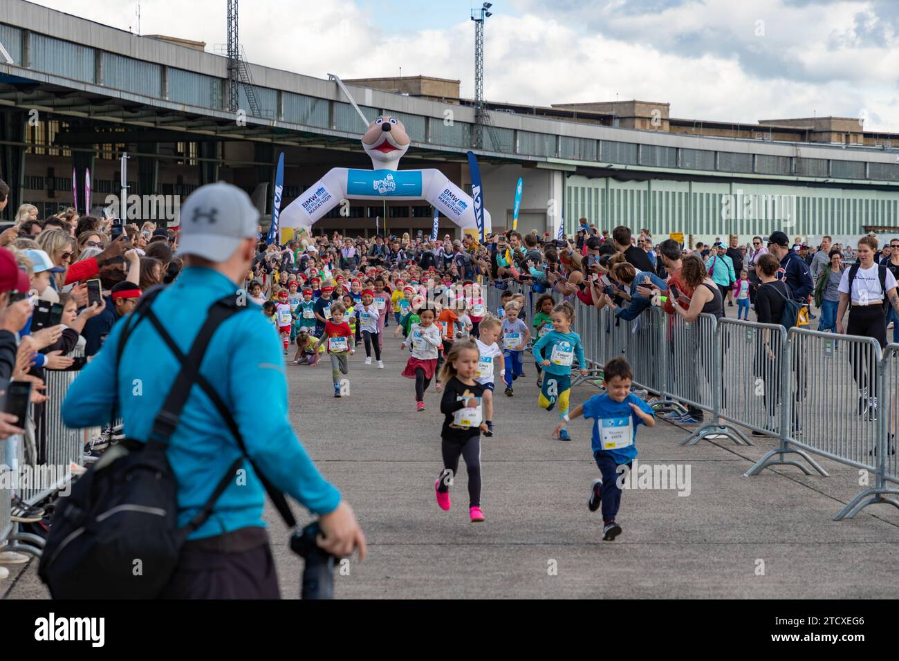 A picture of the children's race as part of the 2023 Berlin Marathon, that took place at the Tempelhof Airport. Stock Photo