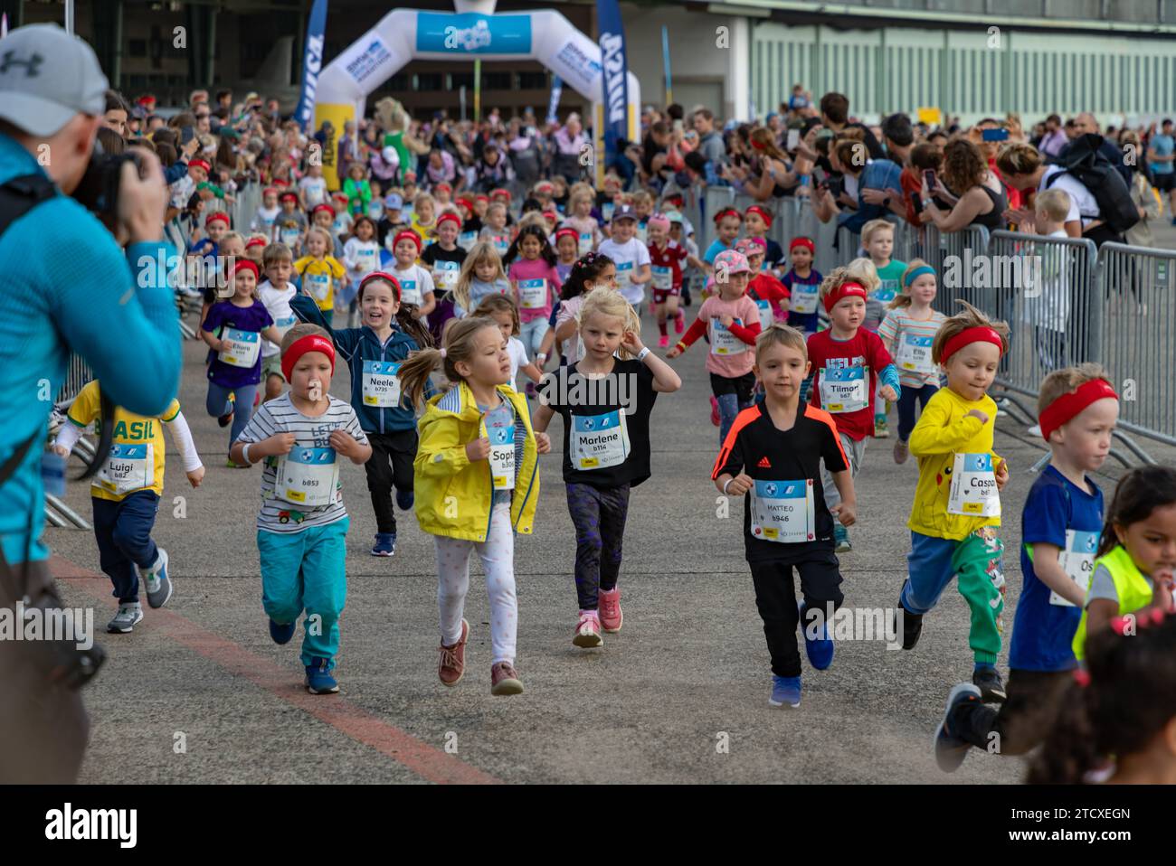 A picture of the children's race as part of the 2023 Berlin Marathon, that took place at the Tempelhof Airport. Stock Photo