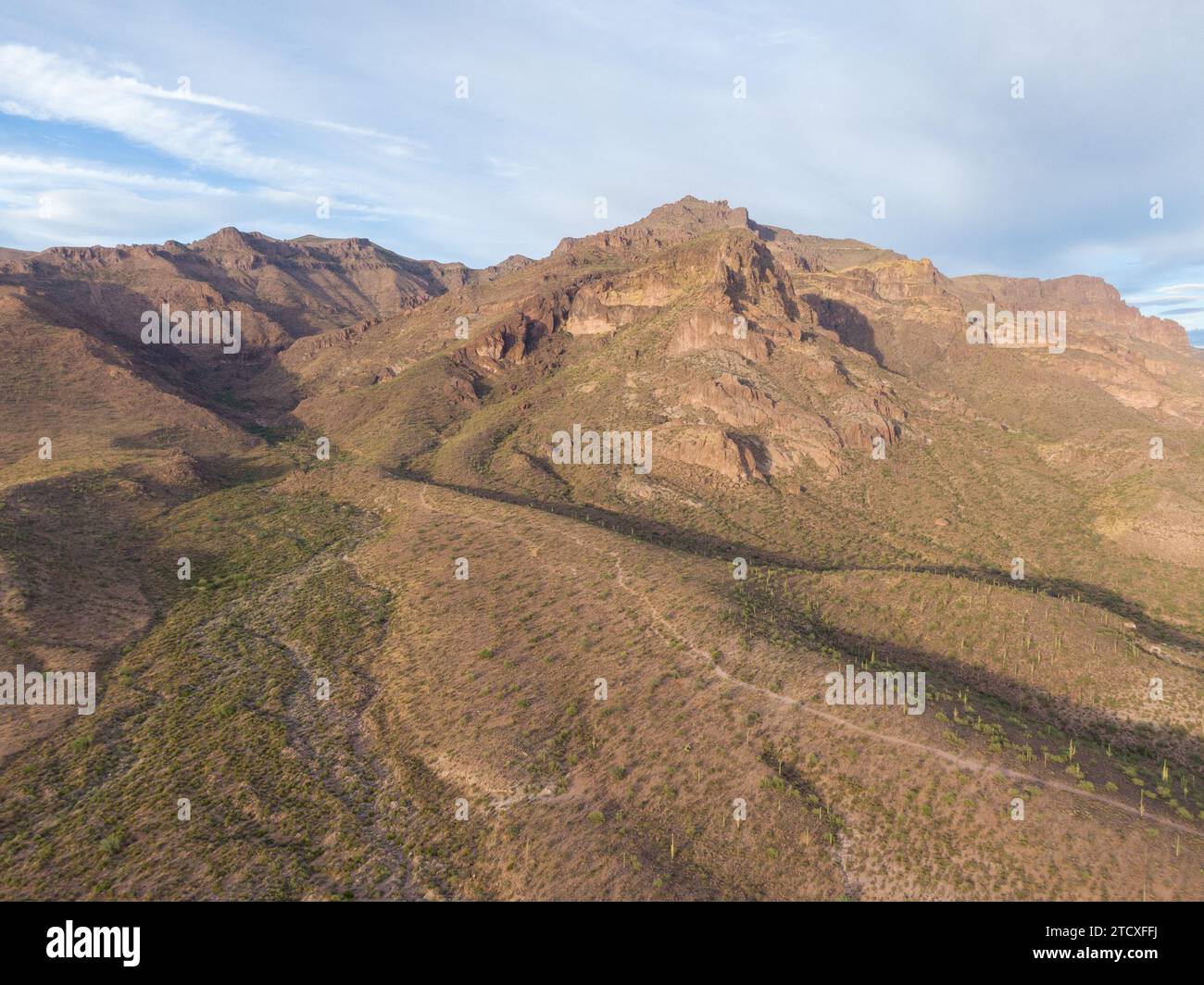 various drone images of the superstition mountains in gold canyon Arizona taken at different times of the day. Stock Photo