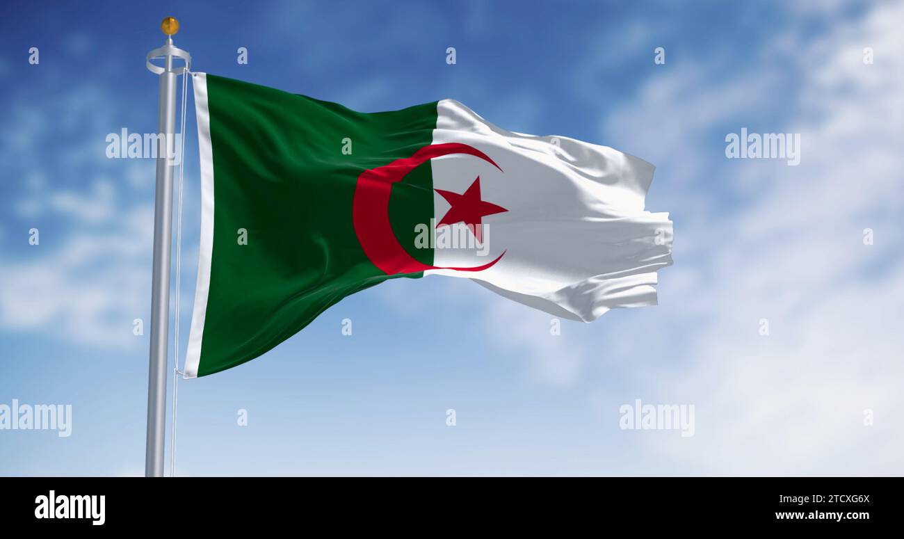 Close-up of Algeria national flag waving on a clear day. two vertical bars, green and white, with a red star and crescent in the center. 3d illustrati Stock Photo