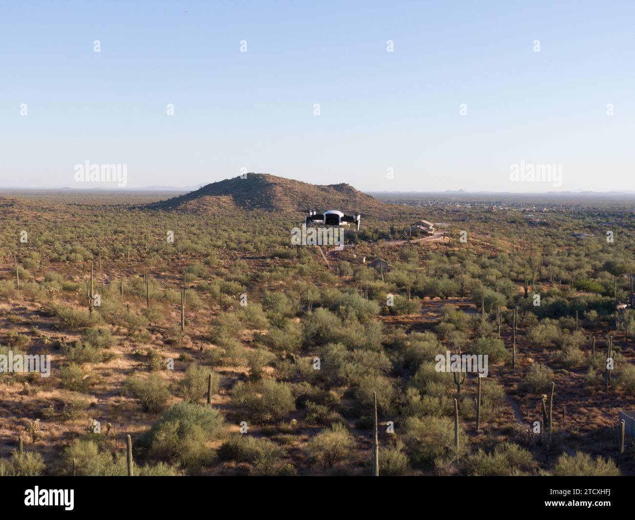 various drone images of the superstition mountains in gold canyon Arizona taken at different times of the day. Stock Photo