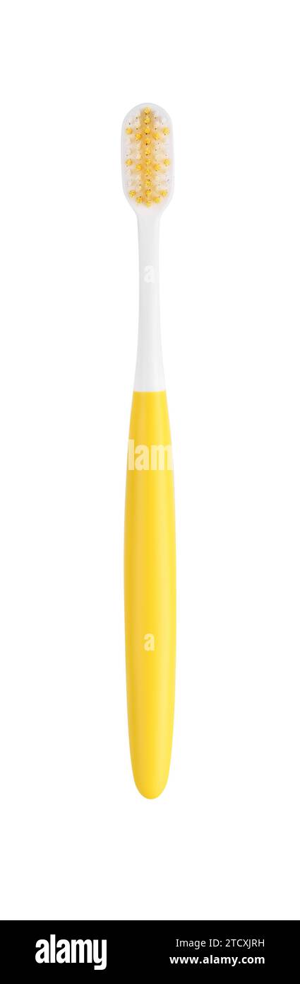 Yellow plastic toothbrush isolated on white. Dental care Stock Photo ...
