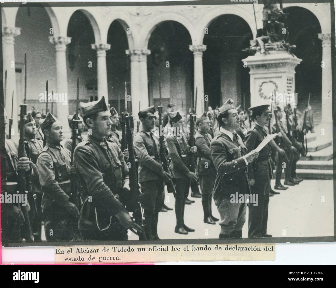 Toledo, July 21, 1936. Civil war, in the Toledo castle an officer reads ...