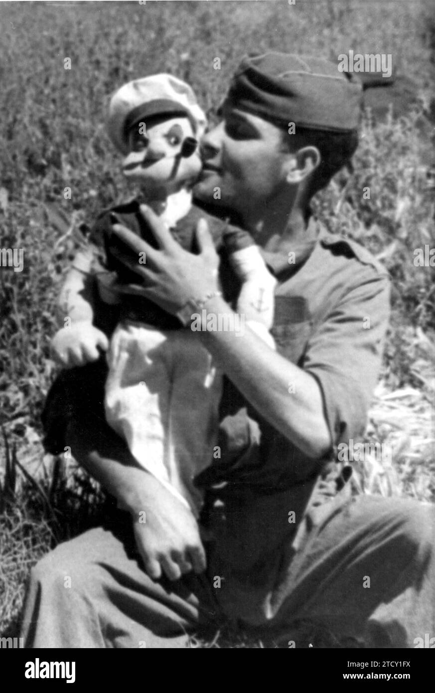 04/30/1937. A popular army soldier with a Popeye doll as a Mascot. Credit: Album / Archivo ABC / José Díaz Casariego Stock Photo