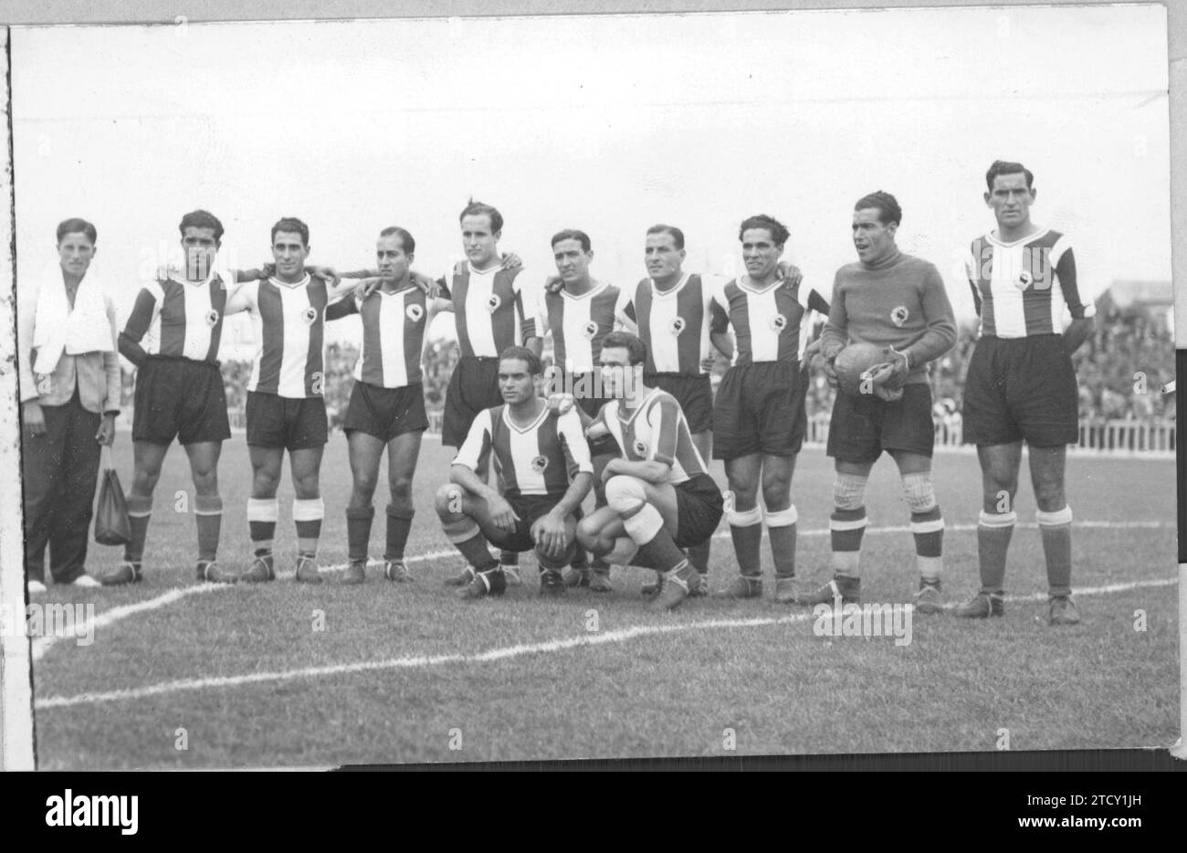 12/31/1929. Hercules de Alicante team that played against Celta in a match in which victory earned them the second division championship and promotion to the first league. From left to right: Salvador, Maciá, Tatono, Blazquez, Irles, Deniz, Roldán, Perez and Moro. Kneeling, Múgica and Orriels. Credit: Album / Archivo ABC / Luis María Caruncho Amat Stock Photo