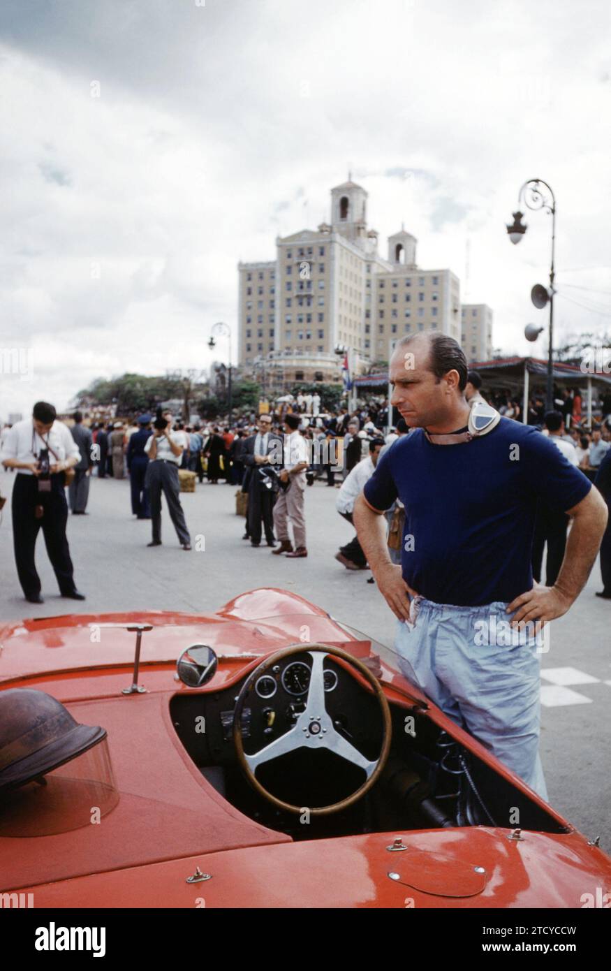 HAVANA, CUBA - FEBRUARY 24:  Juan Manuel Fangio (1911-1995) driver of the Maserati 300S stands next to his car before the start of the 1957 Cuban Grand Prix on February 24, 1957 in Havana, Cuba.  (Photo by Hy Peskin) *** Local Caption *** Juan Manuel Fangio Stock Photo