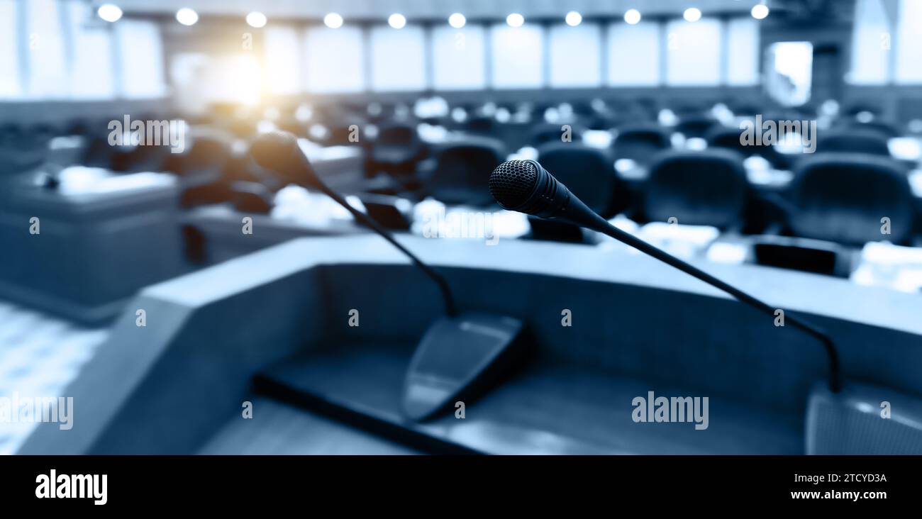 The microphones in front of empty chairs Stock Photo - Alamy