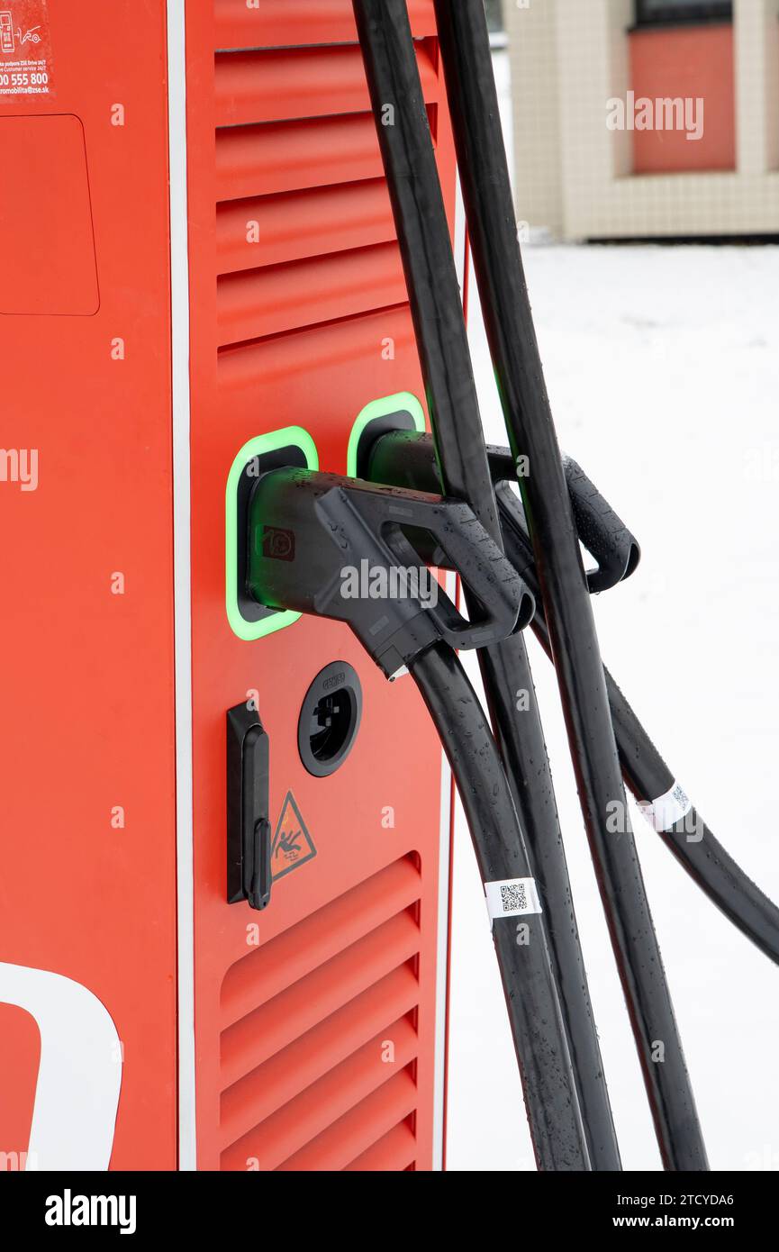 Nitra, Slovakia - December, 10, 2023 : Electric vehicle charging station ZSE Drive, member of the E.ON group. Electric vehicle supply equipment (EVSE) Stock Photo