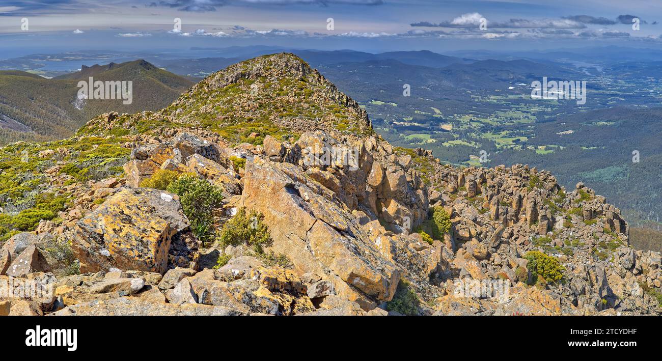 Panoramic view of wild, rocky, alpine, mountain landscape on sunny day at Collins Bonnet, Mount Wellington, Hobart, Tasmania, Australia Stock Photo