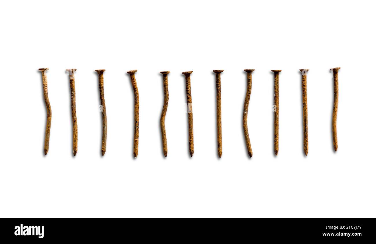 Old rusty bent nails isolated on white background Stock Photo