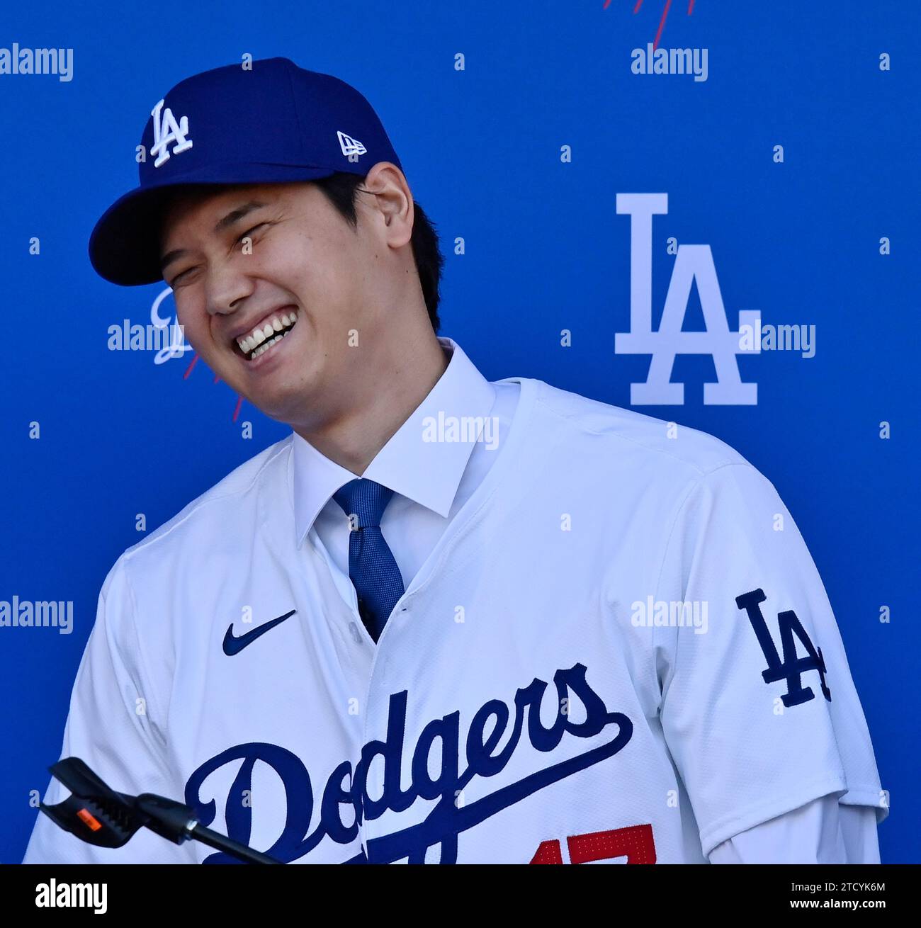 Shohei Ohtani officially dons Dodger blue for the first time today, five days after announcing a 10-year contract for a historic mountain of money as he is introduced during a news conference Shohei Ohtani officially dons Dodger blue for the first time today, five days after announcing a 10-year contract for a historic mountain of money as he is introduced during a news conference