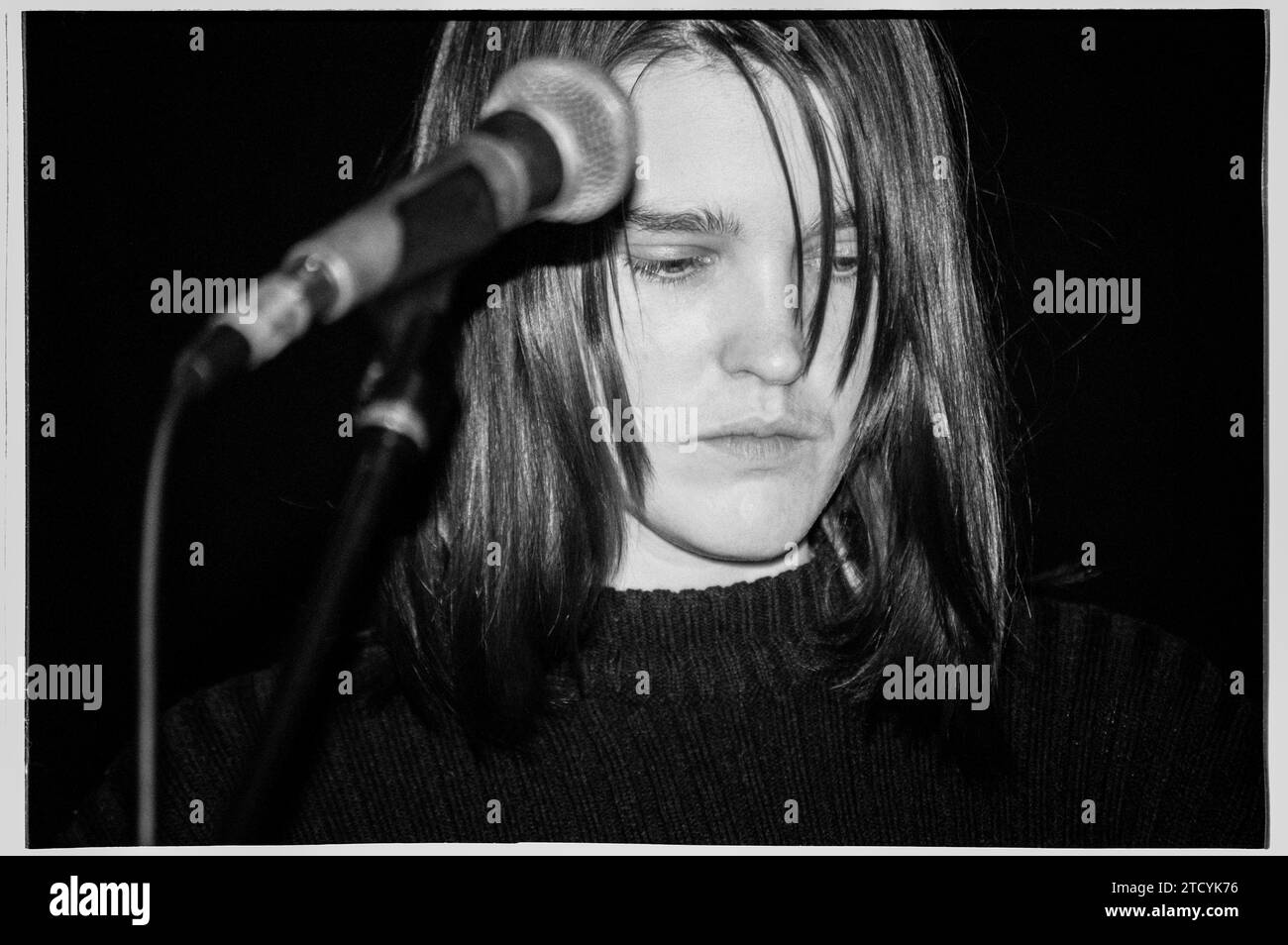 TRISH KEENAN, BROADCAST, 1997: A very young Trish Keenan (1968-2011) the singer of the British Electronic band Broadcast playing as support to Stereolab Cardiff University, Wales, UK on 21 November 1996. This picture was taken at the start of the band's critically acclaimed career touring with their first single and debut EP 'The Book Lovers'. Sadly Trish died unexpectedly of pneumonia following contracting swine flu in January 2011 while on tour in Australia. Photo: Rob Watkins Stock Photo