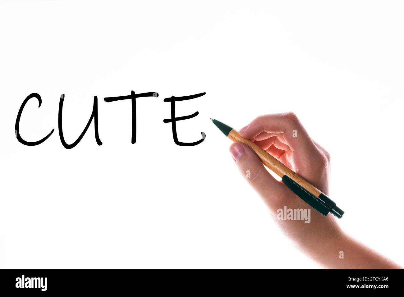 Children hand with pen write on an blue white background. Writing hand