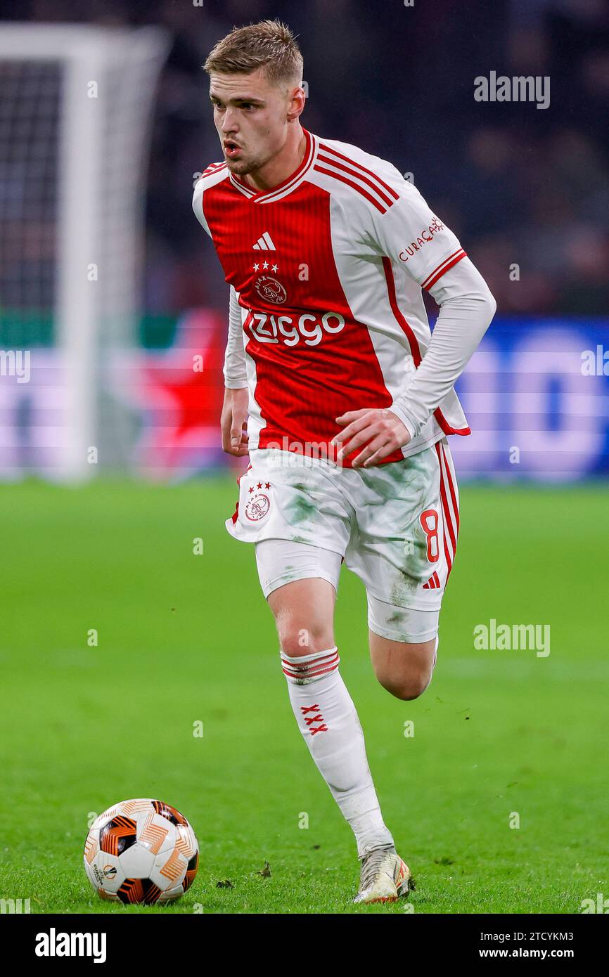 AMSTERDAM, NETHERLANDS - DECEMBER 14: Kenneth Taylor (Ajax) controls the ball during the Group B - UEFA Europa League 2023/24 match of AFC Ajax and AE Stock Photo