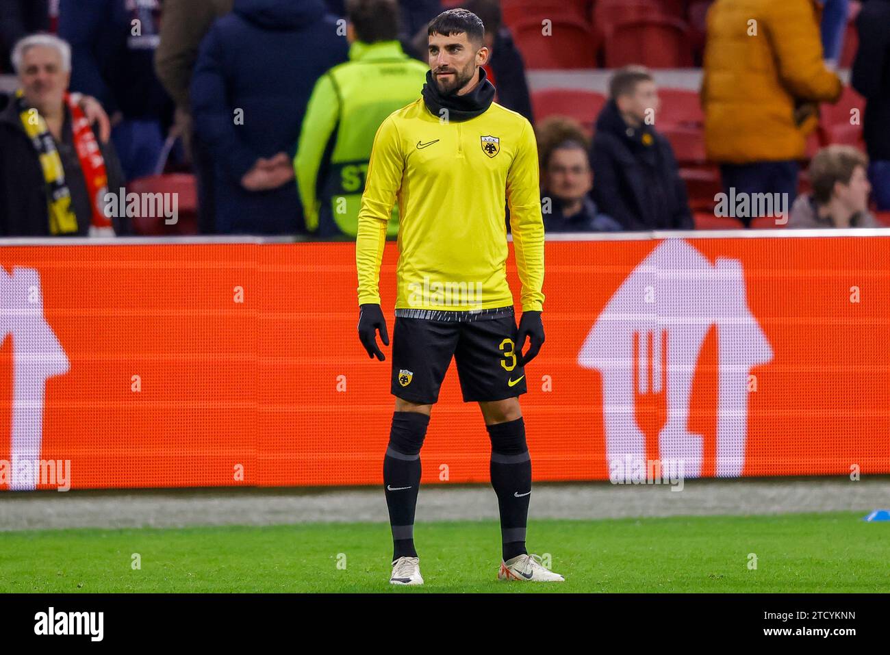 AMSTERDAM, NETHERLANDS - DECEMBER 14: Milad Mohammadi (AEK Athene) warms up during the Group B - UEFA Europa League 2023/24 match of AFC Ajax and AEK Stock Photo