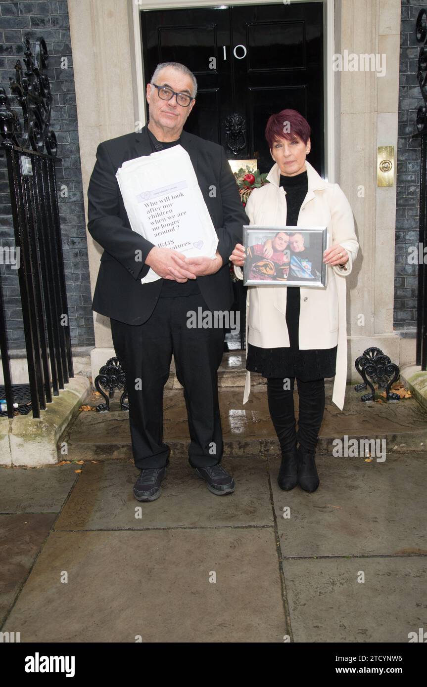 Sean Kennedy, Dr Anna Kennedy OBE and her team hand in a petition at