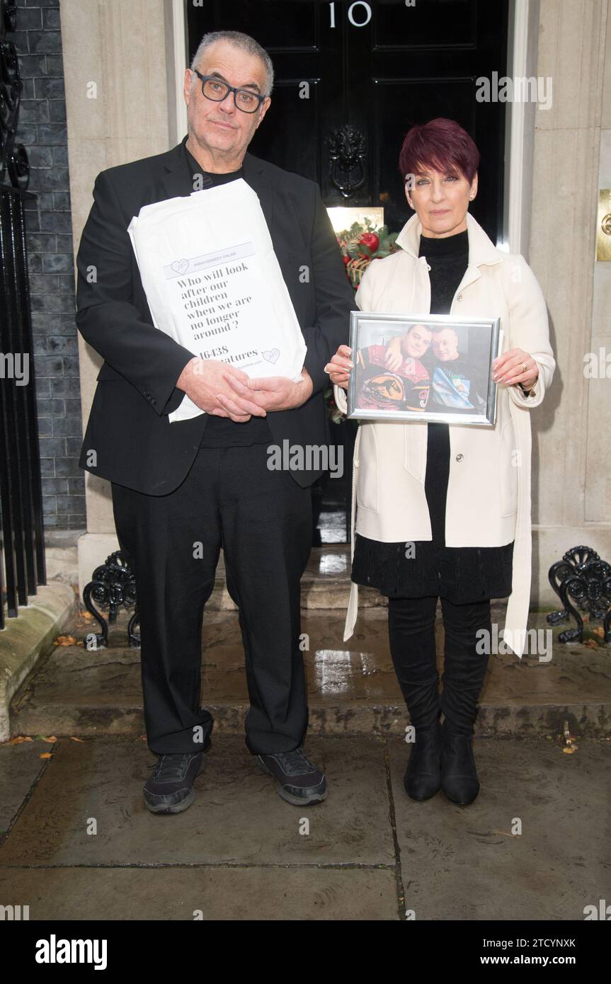 Sean Kennedy, Dr Anna Kennedy OBE and her team hand in a petition at