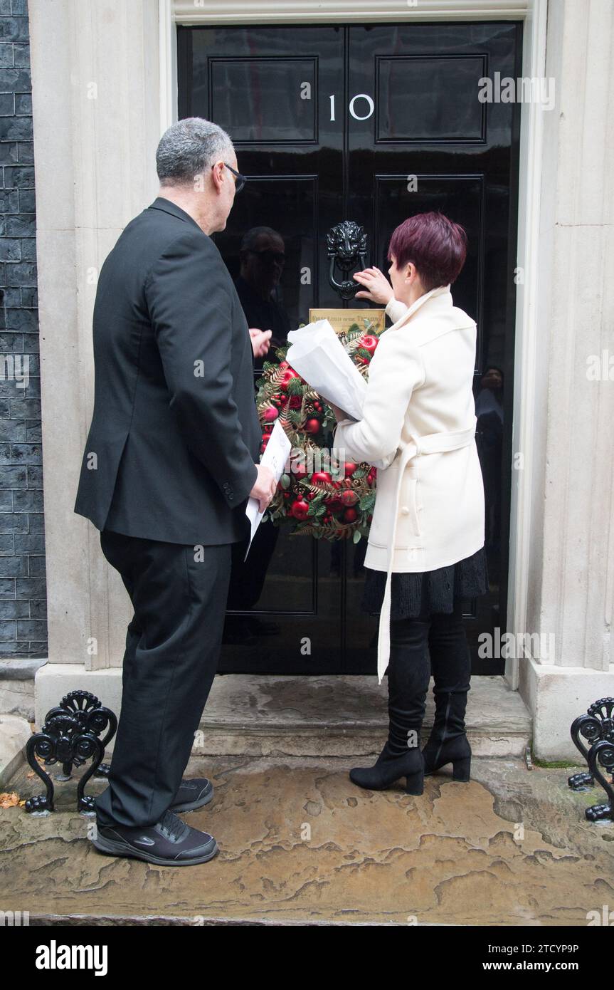 Sean Kennedy, Dr Anna Kennedy OBE and her team hand in a petition at