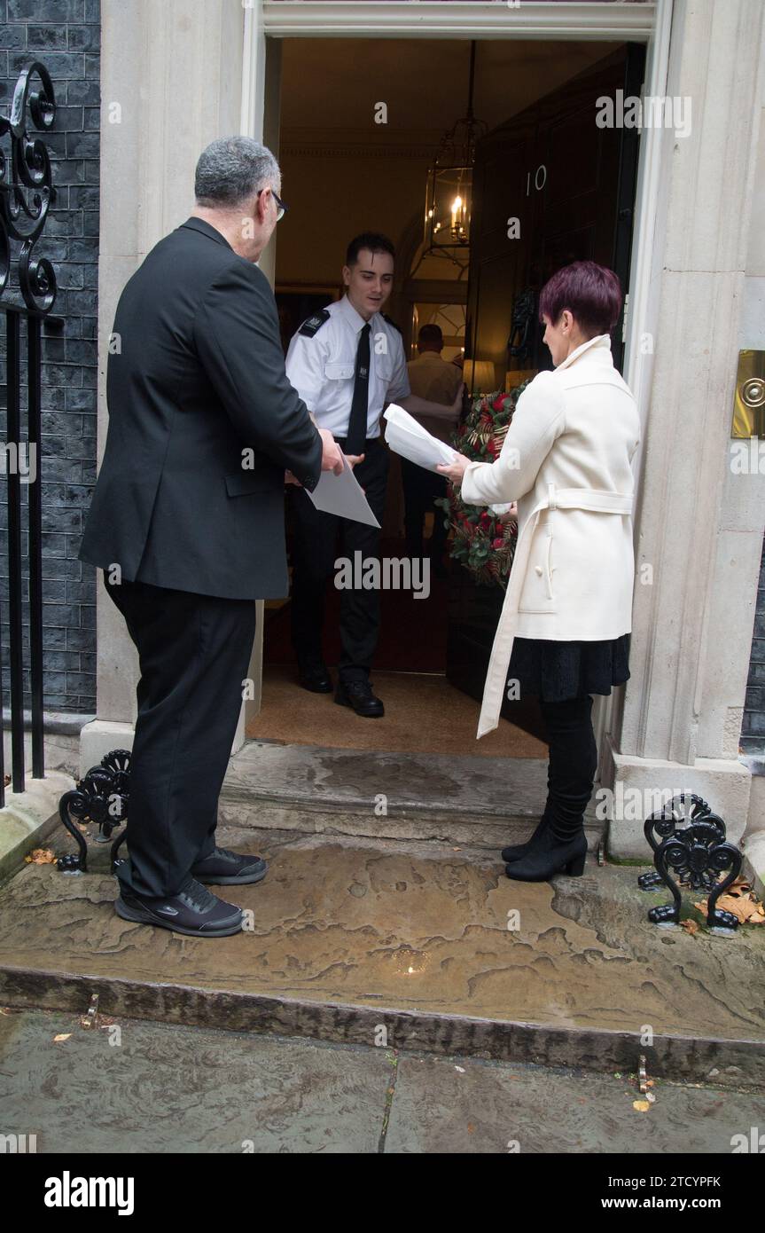 Sean Kennedy, Dr Anna Kennedy OBE and her team hand in a petition at
