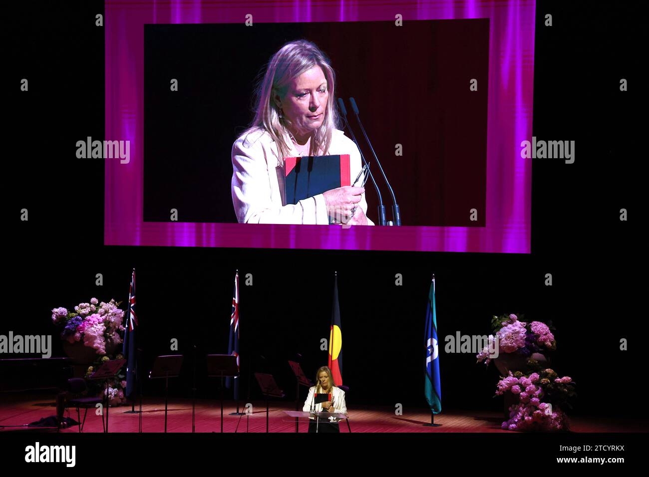 Tessa Humphries speaks during during the State Memorial Service for Australian comedian and actor Barry Humphries at the Sydney Opera House in Sydney, Friday, December 15, 2023. A State Memorial Service for Barry Humphries will recognise the late entertainers contribution to Australian arts and entertainment. AAP Image/Pool, David Gray NO ARCHIVING SYDNEY NSW AUSTRALIA *** Tessa Humphries speaks during during the State Memorial Service for Australian comedian and actor Barry Humphries at the Sydney Opera House in Sydney, Friday, December 15, 2023 A State Memorial Service for Barry Humphries wi Stock Photo