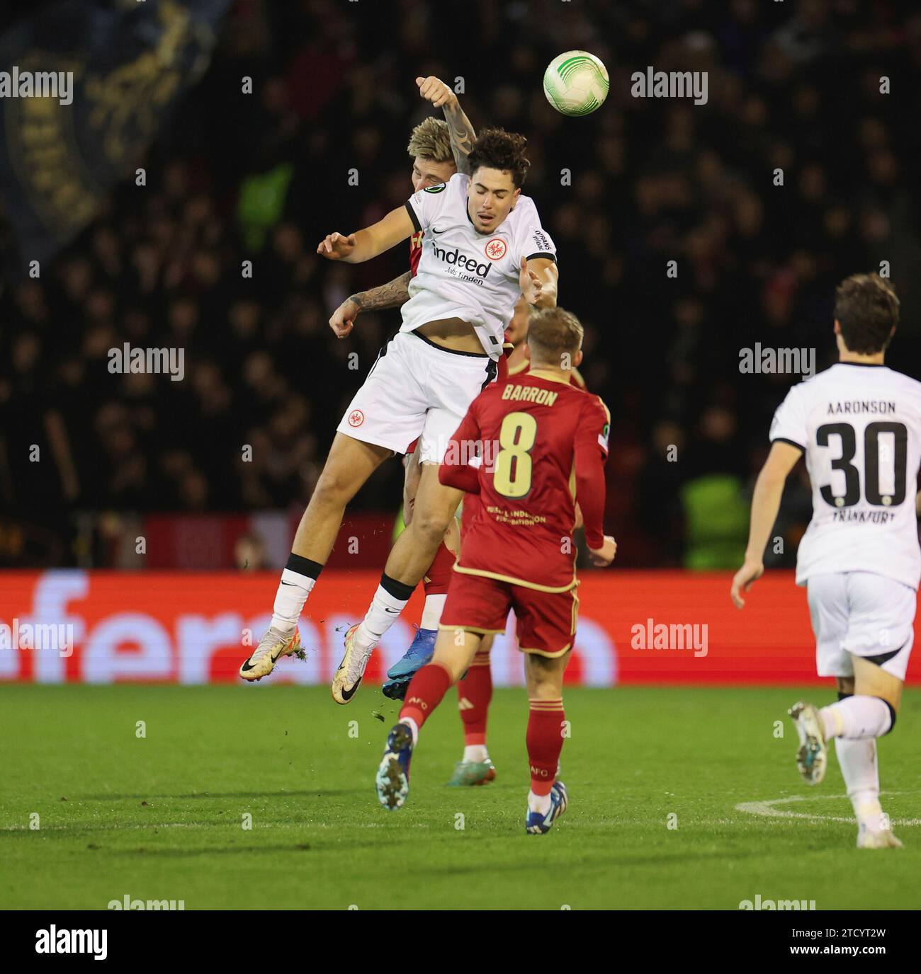 14.12.2023, Fussball UEFA Europa Conference League, Aberdeen FC - Eintracht Frankfurt, emonline, emspor, v.l., Nacho Ferri (Eintracht Frankfurt), Connor Barron (Aberdeen FC) DFL/DFB REGULATIONS PROHIBIT ANY USE OF PHOTOGRAPHS AS IMAGE SEQUENCES AND/OR QUASI-VIDEO. xdcx Stock Photo