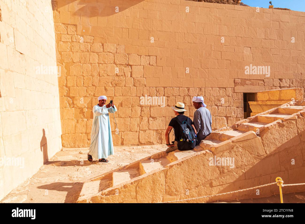 Egyptians in the Temple of Queen Hatshepsut. Luxor, Egypt – October 21, 2023 Stock Photo