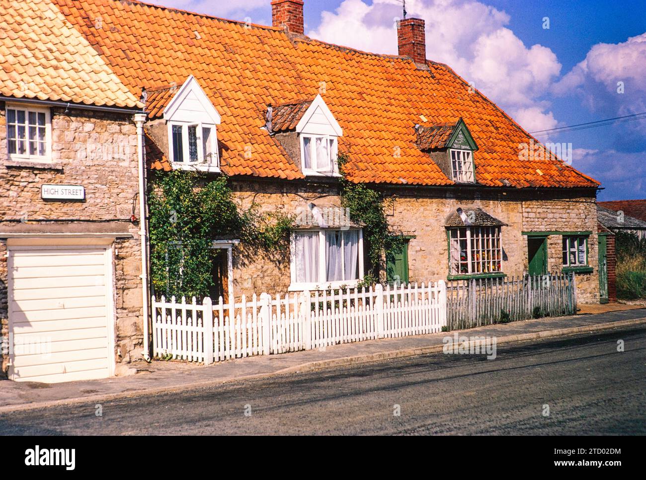 Village houses in High Street, Swinstead, Lincolnshire, England, UK 31 August 1970 Stock Photo