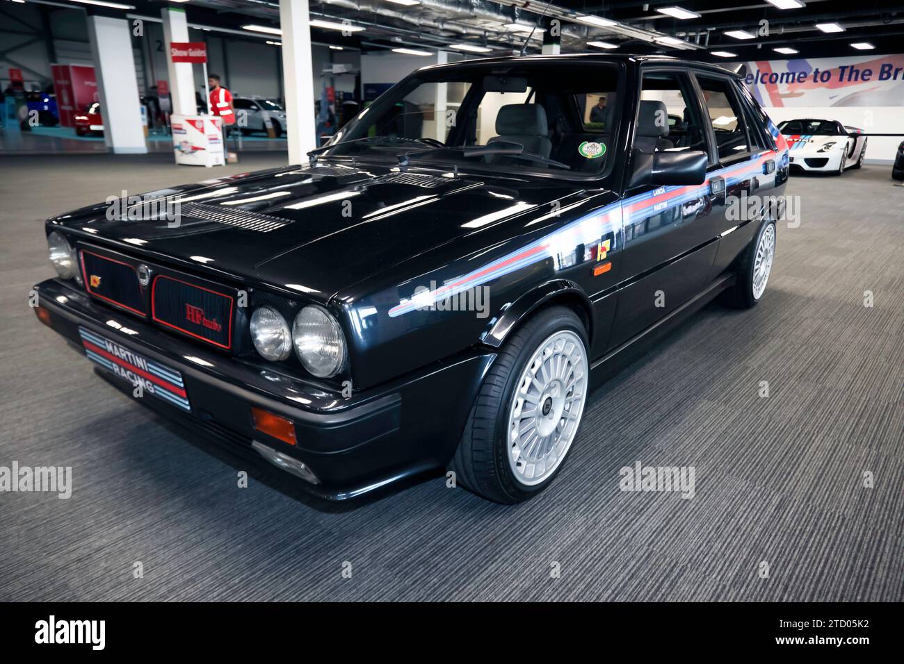Three-quarters front view of a Lancia Delta HF Turbo, on display at the 2023  British Motor Show Stock Photo