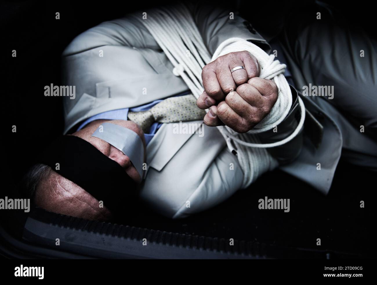 Man in trunk of car, kidnap and rope with danger, criminal violence and ...