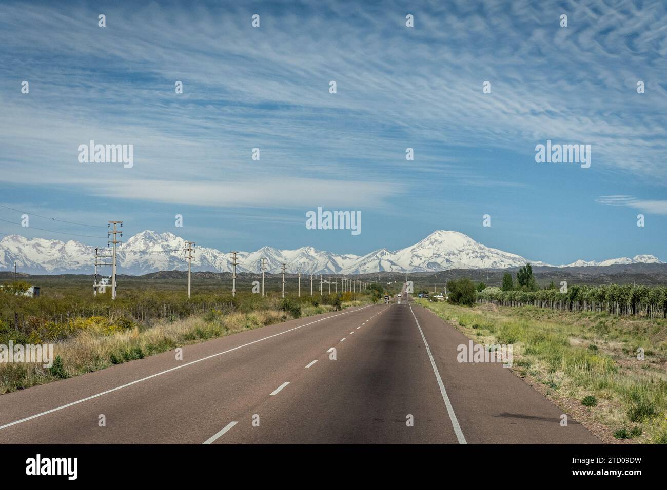 Beautiful view to road and snowy andean peaks, Mendoza countryside Stock Photo