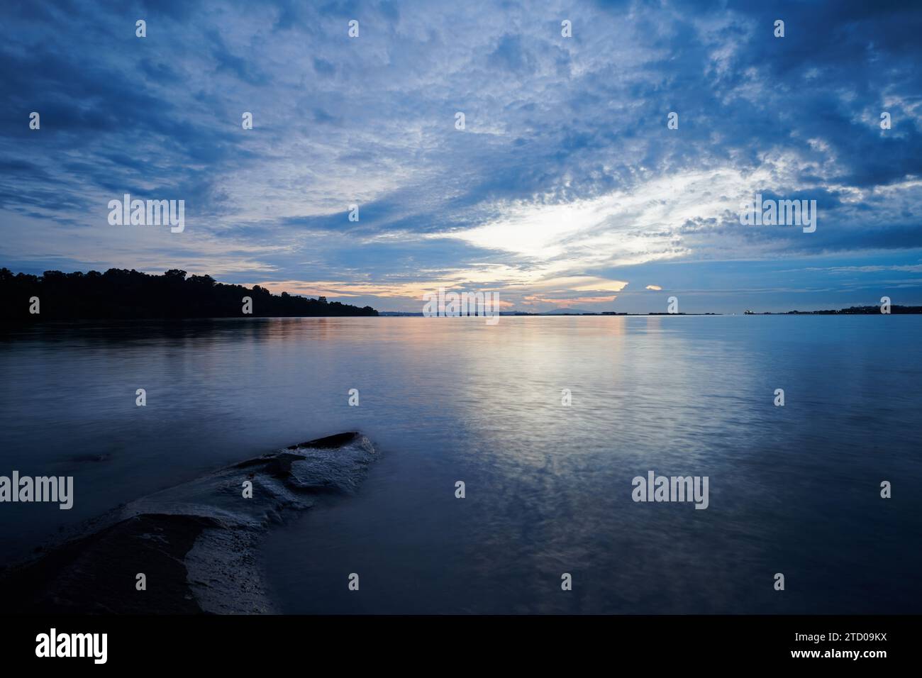 Long exposure at sunrise overlooking ocean Stock Photo - Alamy