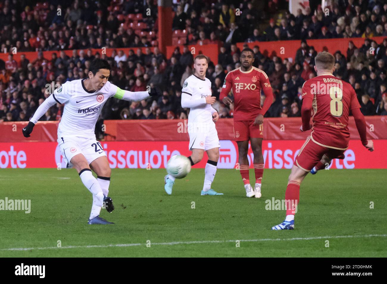 ABERDEEN, SCOTLAND - DECEMBER 14: Eintracht's Makoto Hasebe gets a shot in on goall during the Aberdeen FC v Eintracht Frankfurt Group G-UEFA Europa Conference League match at Pittodrie Stadium on December 14, 2023 in Aberdeen, Scotland. (MB Media) Stock Photo
