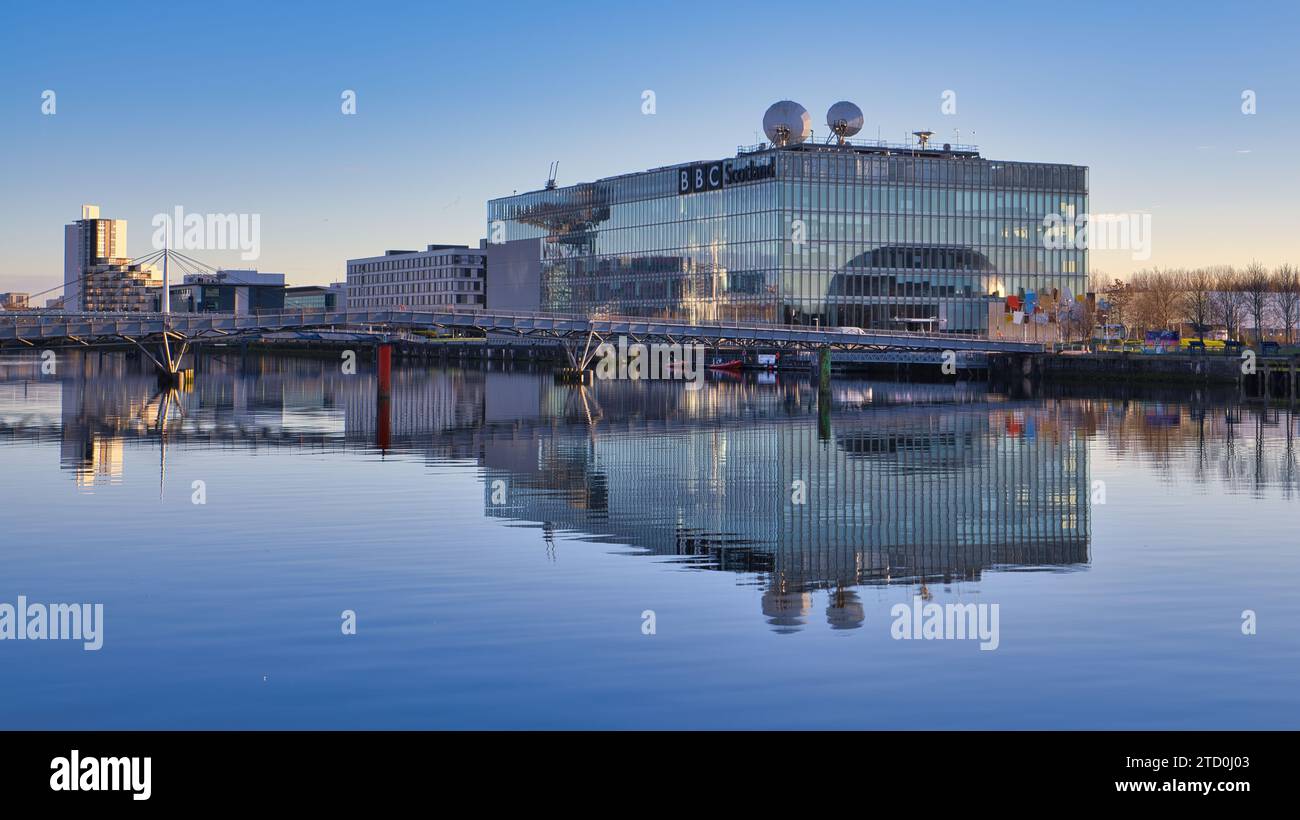 The Millennium Bridge in Glasgow leading over the River Clyde to