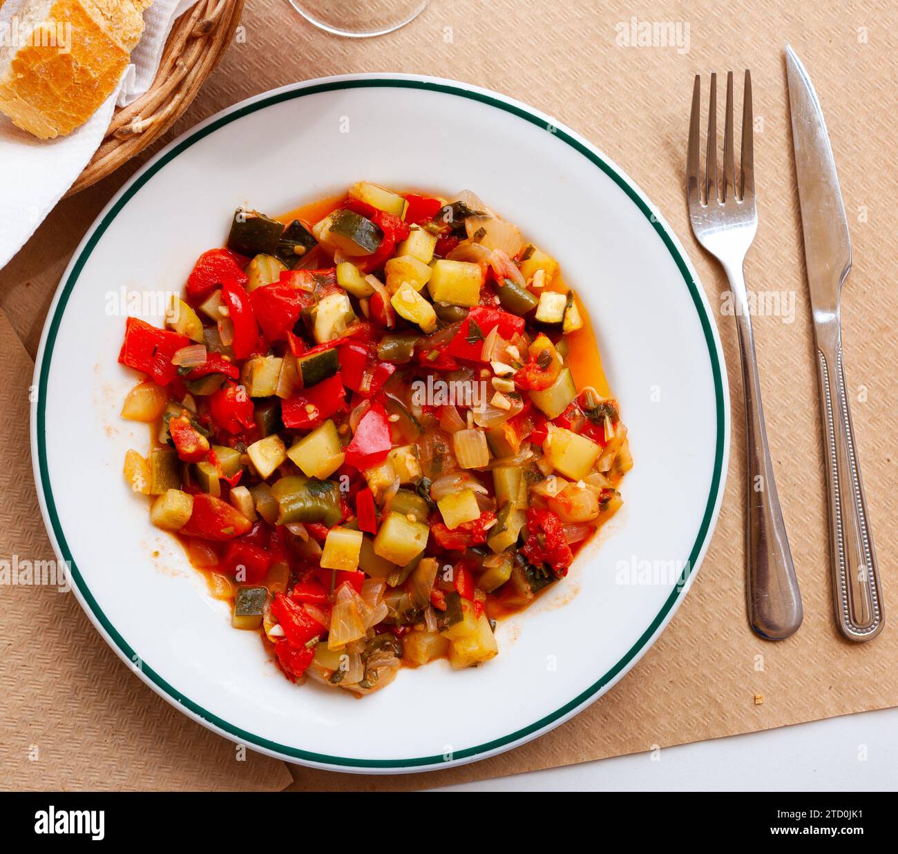Plate of stewed vegetables on table. Vegetarian dish Stock Photo