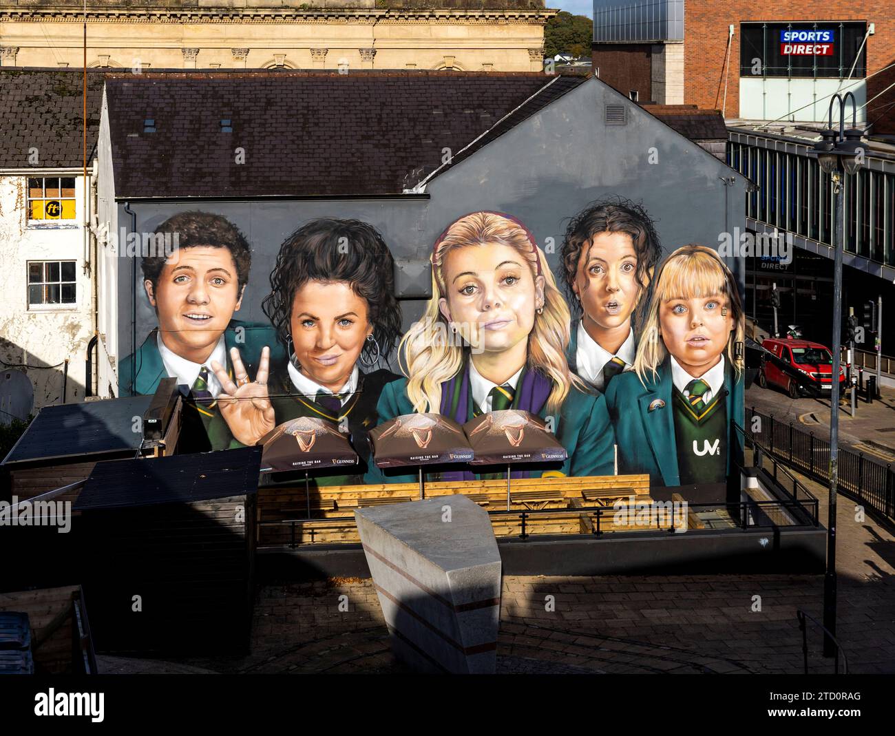 Mural dedicated to the famous award-winning series 'Derry Girls' on Orchard Street, in the city center of Derry, Northern Ireland Stock Photo