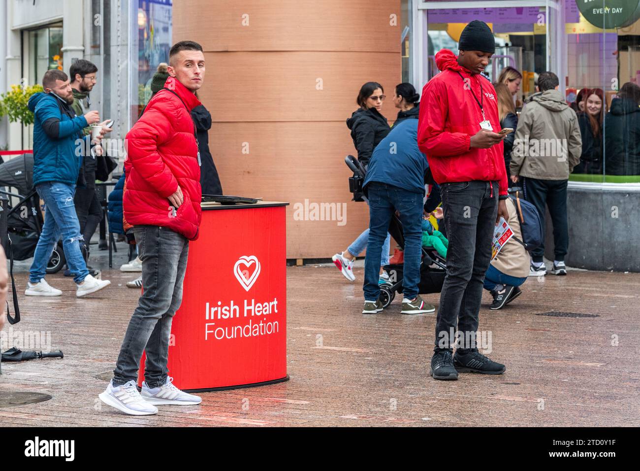 Irish Heart Foundation charity fundraisers or 'chuggers' in Cork City, Ireland. Stock Photo