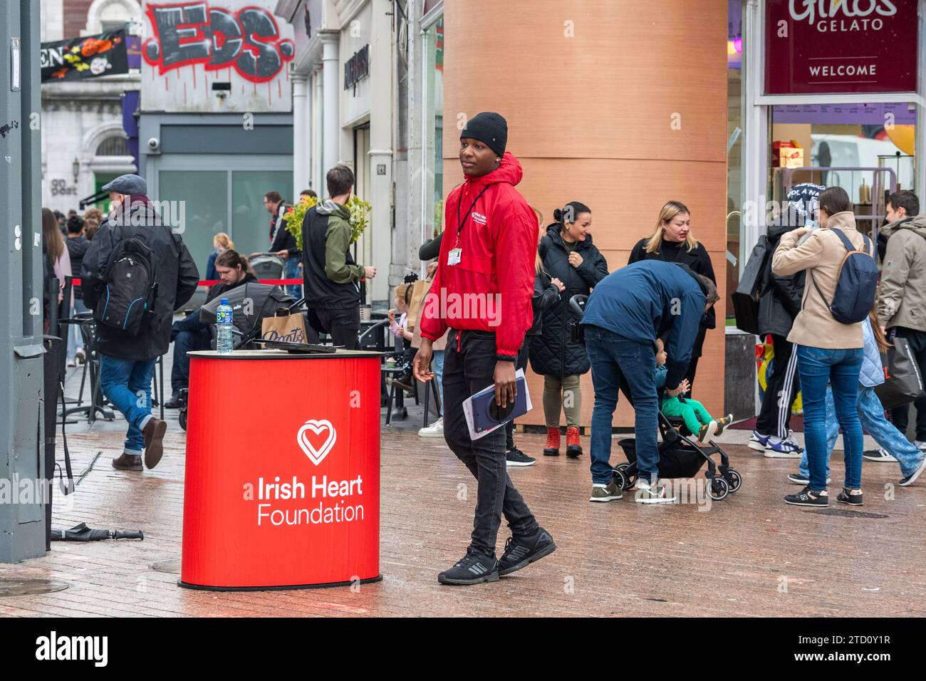 Irish Heart Foundation charity fundraiser or 'chugger' in Cork City, Ireland. Stock Photo